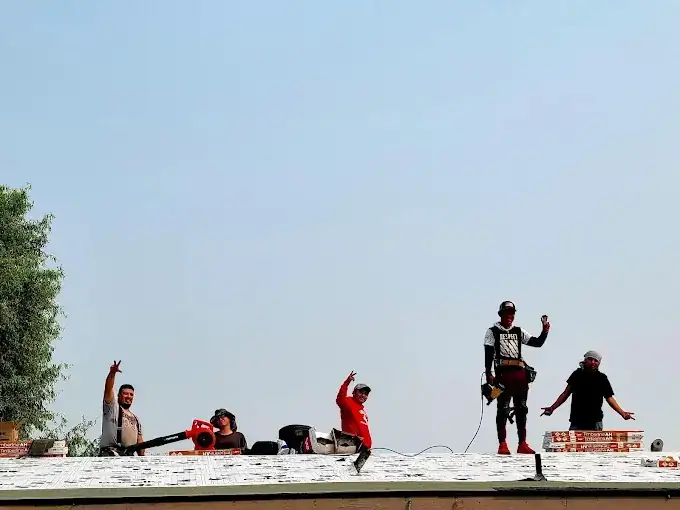 J&V Builders crew on a completed roofing project in Central Washington